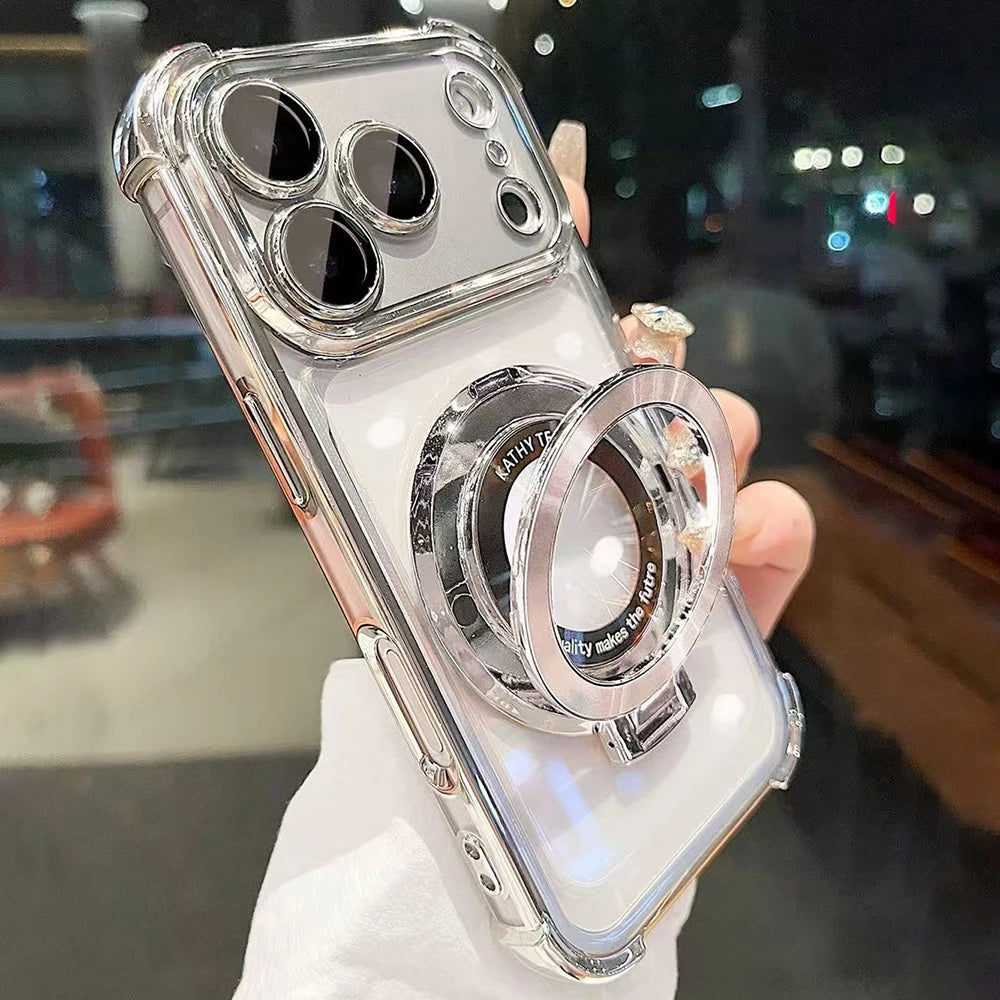A clear iPhone case with a magnetic stand and lens protection is held up against a blurred background.