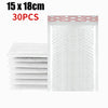 Stack of 30 self-sealing pearl film bubble shipping bags measuring 15 x 18 cm.