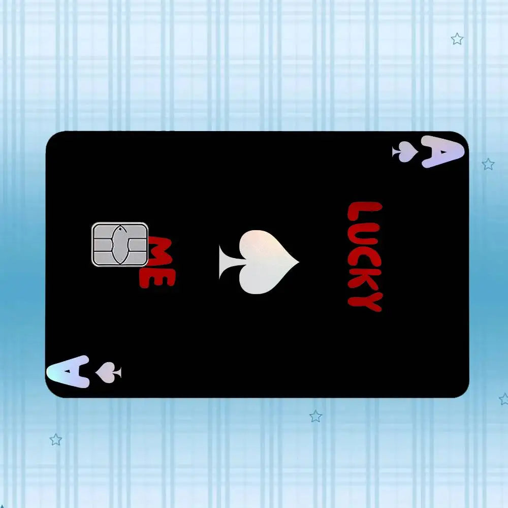 A black card displaying various letters and symbols, including A, E, I, O, U, and a heart shape.