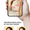 A woman is shown using an ultra-long selfie stick with a Bluetooth remote and fill light to take a photo.