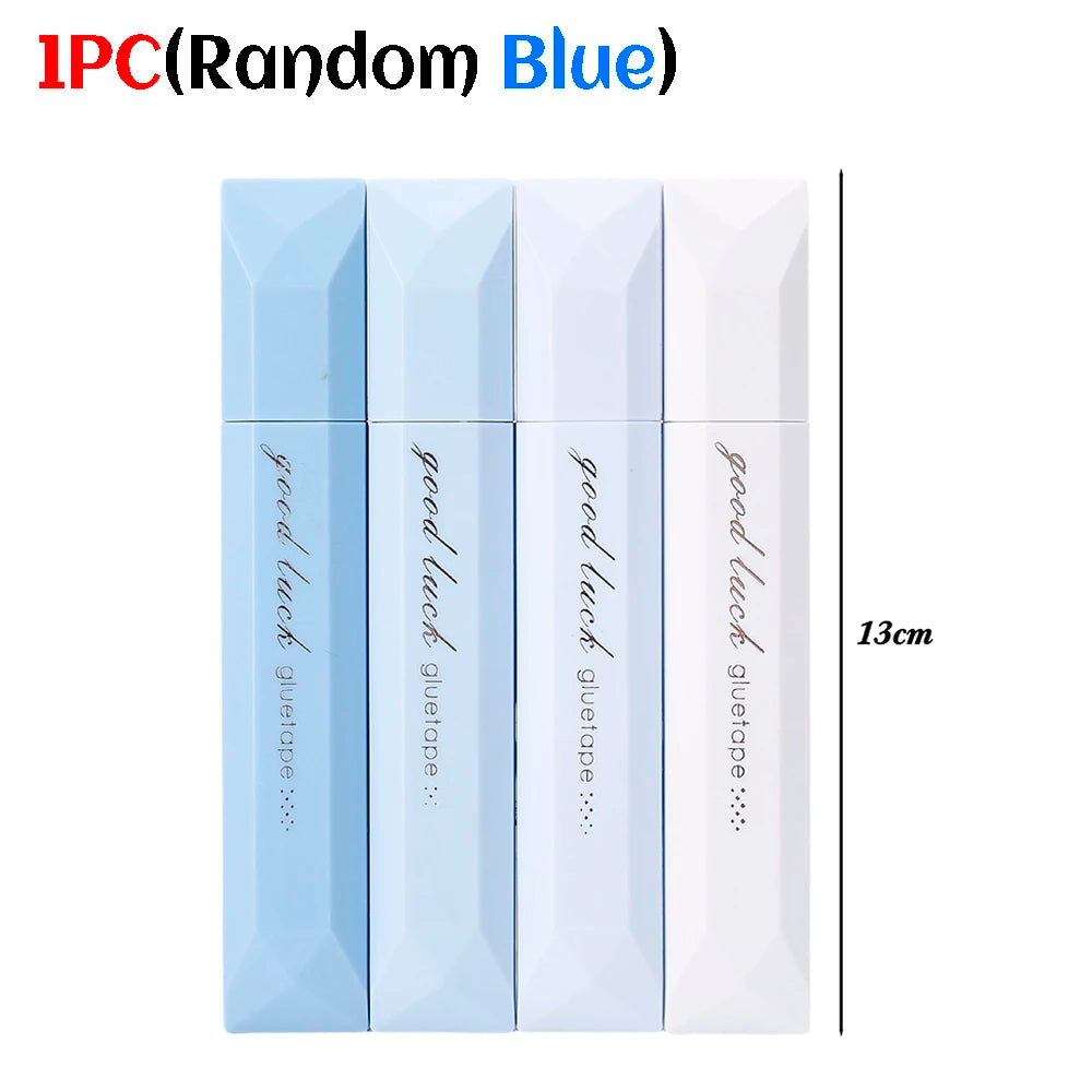 A set of four blue and white gradient double-sided tape pens for scrapbooking and journaling