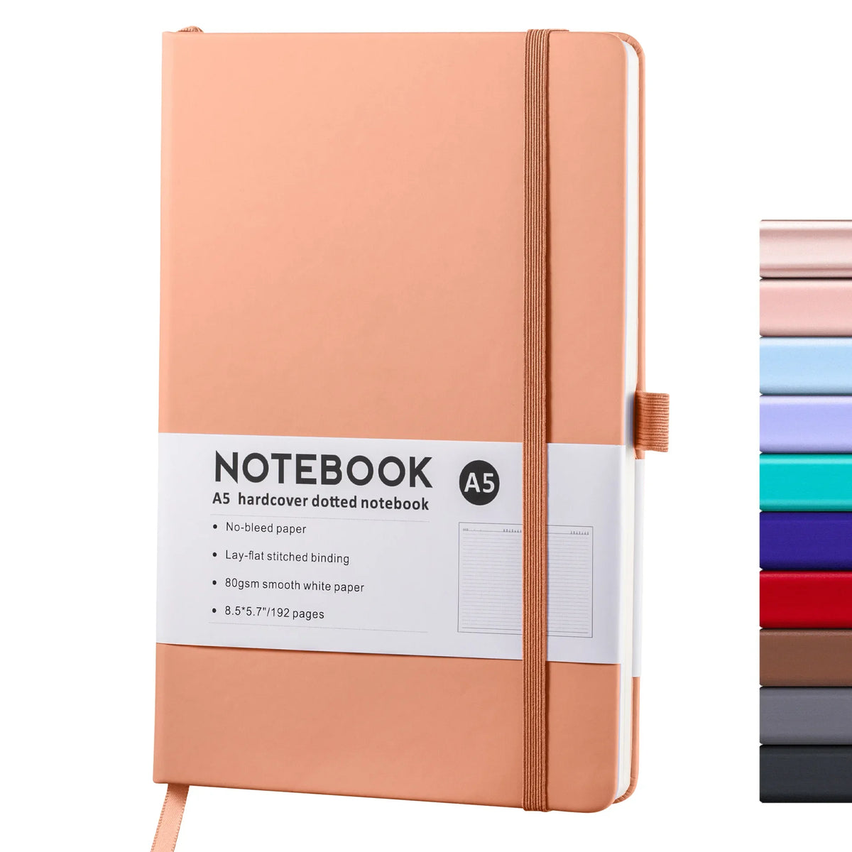 A pink notebook with a tan cover and a light pink spine, featuring a white label detailing its specifications.