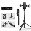 Black extendable phone tripod featuring an LED ring light and mirror, shown with various extension options.