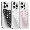 Three white silicone suction cup phone mounts showing different grip textures and colors