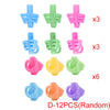 A collection of silicone pencil grips in various colors and shapes, including blue, green, pink, yellow, and purple.