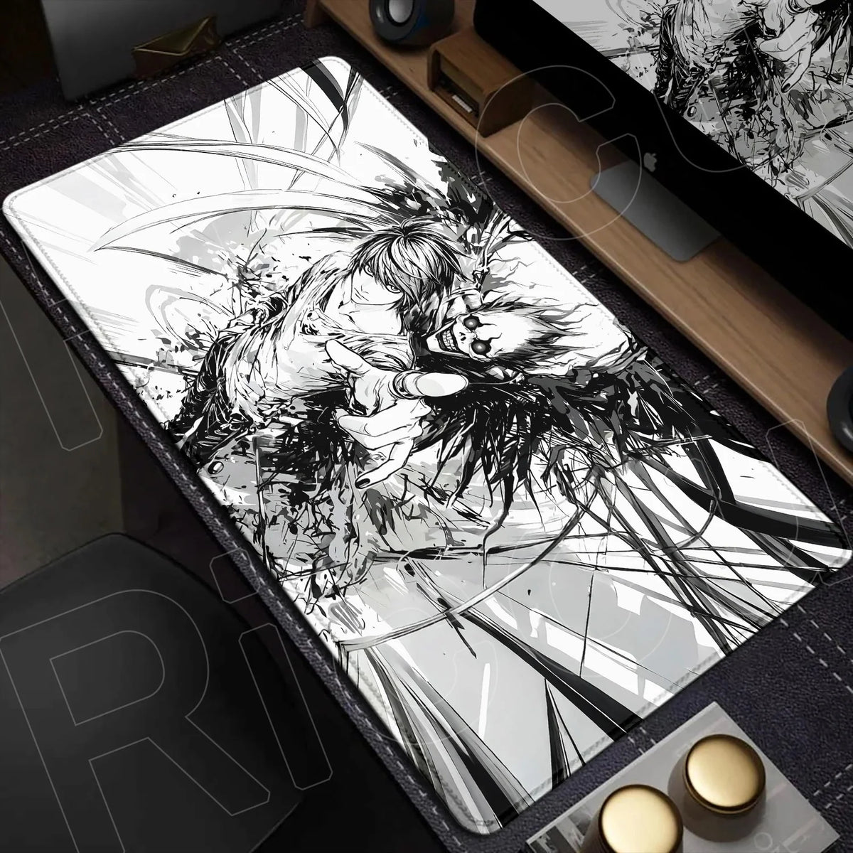 A large, black and white illustration of a fierce creature or spirit on an oversized mouse pad.