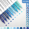 A collection of nine blue acrylic brush markers in various shades and tips arranged on a white background.