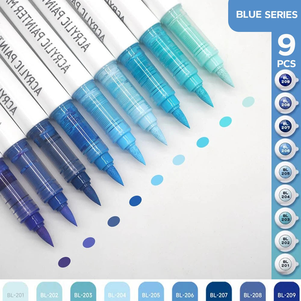 A collection of nine blue acrylic brush markers in various shades and tips arranged on a white background.