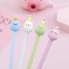 A collection of cute cartoon fruit gel pens in pastel colors, including blue, white, green, and pink.