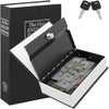 A black book-shaped piggy bank with a lock and key, displaying stacks of US currency inside.