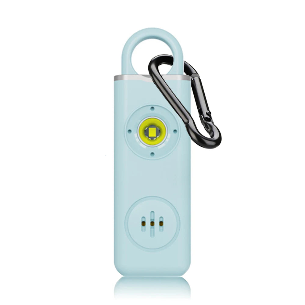 A light blue personal safety alarm device with a black handle and LED light.