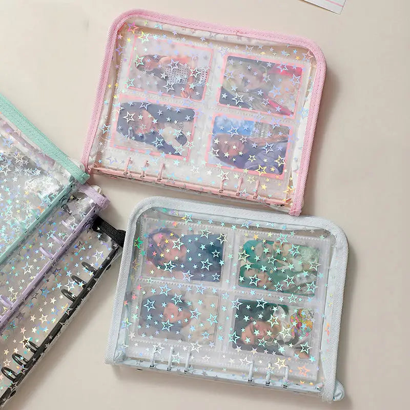 A pink and clear transparent zipper photo binder featuring multiple compartments with star-themed images.