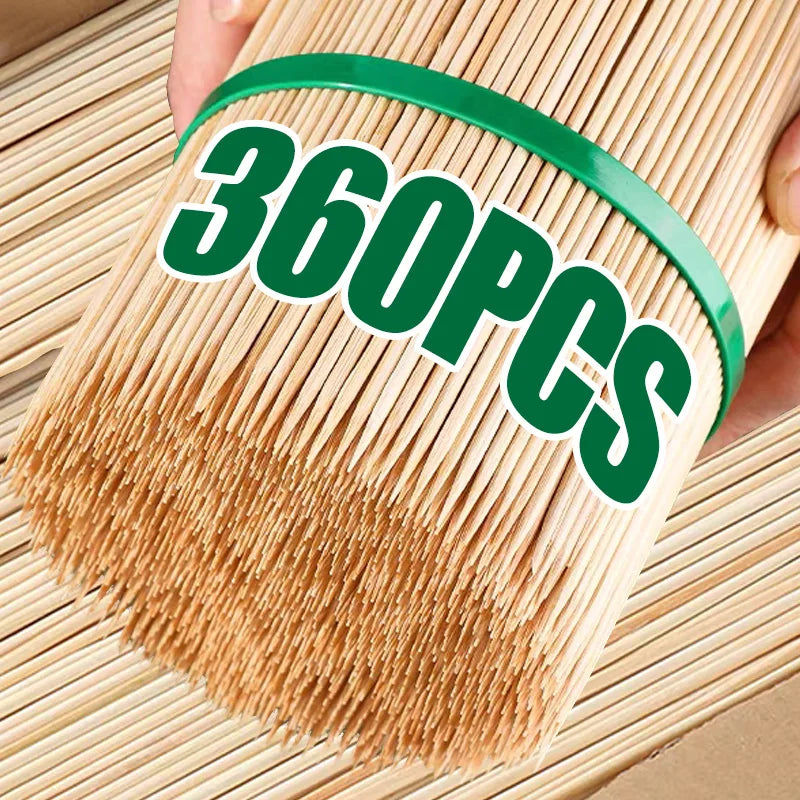 A bundle of natural bamboo skewers with a green rubber band around the middle, showing 360 pieces.
