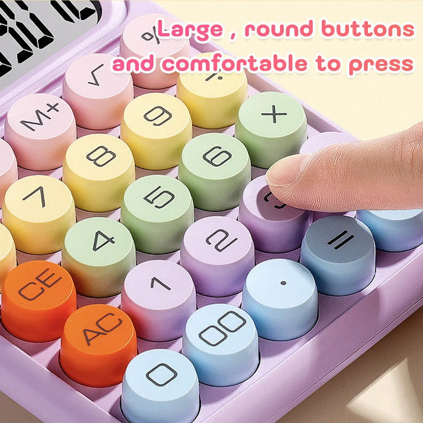 A close-up view of a large, round button calculator with various colored keys and a pink case.