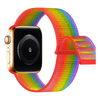 A close-up of an Apple Watch with a colorful, multi-colored sport hook and loop strap.