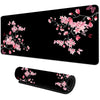Schwarze Gaming-Mauspad mit rosa Blumenmuster und Roll-Aufbewahrungsmöglichkeit