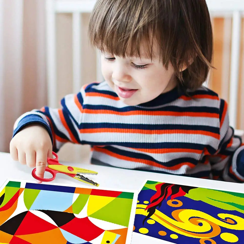 A young child is using decorative zig zag edge scissors to cut colorful paper for a craft project.