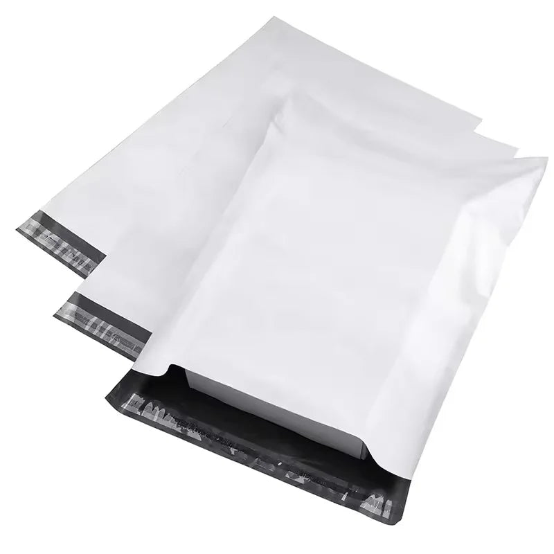 A stack of white bulk waterproof packaging bags for shipping.