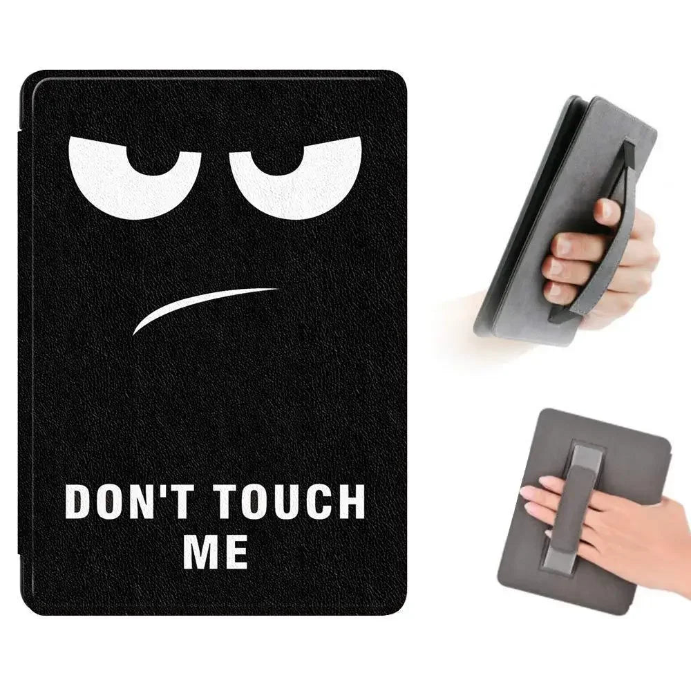 A black leather case with a distressed face emoji design and a matching protective cover for an electronic device.
