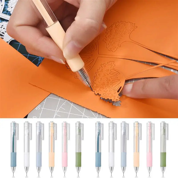 A hand is using a precision utility knife to cut an orange piece of paper, with a set of precision utility knives displayed b