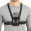 A person wearing a gray long-sleeve shirt with an adjustable phone clip holder and chest strap attached to their shirt.