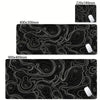Black abstract desk mat featuring white contour lines and a white mousepad.