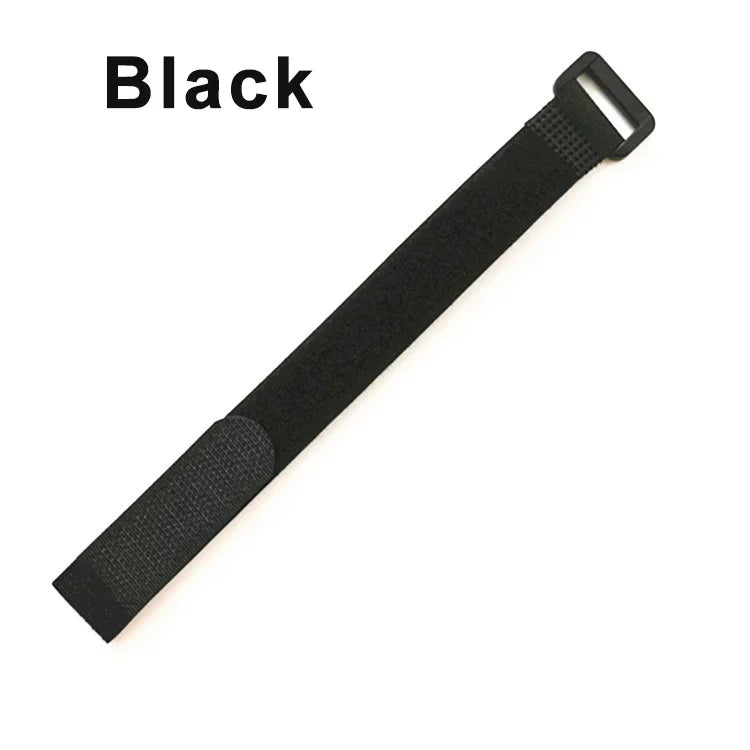 Black reusable hook and loop cable tie strap with a plastic buckle.