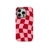 A red and pink checkered pattern phone case for a smartphone.