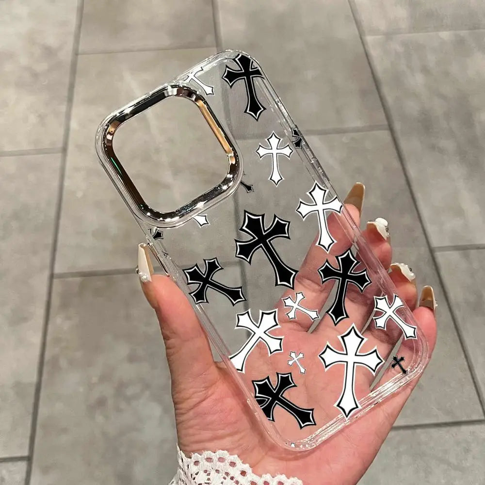 A hand holds a clear holographic gradient phone case featuring black and white crosses on a light gray background.