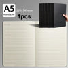 A5 kraft cover notebook with a black transverse line visible next to an open page.
