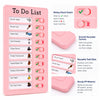 A pink reusable sliding chore chart board with various tasks like brushing teeth and cleaning a room