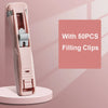 A pink handheld binder clip pusher with stainless steel filling clips displayed on a light pink background.