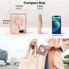 A pink portable desk fan is shown next to an iPhone 12 Pro and a handbag.