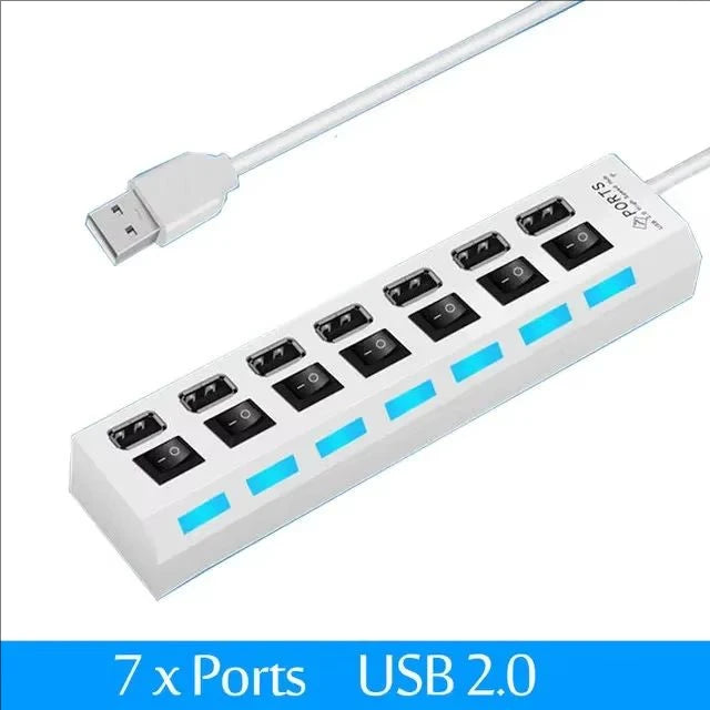 A white 7x Ports USB 2.0 hub splitter with a cable connected to the side.