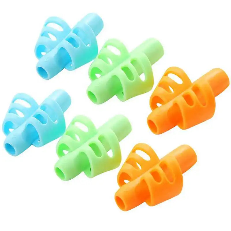 A collection of colorful ergonomic silicone pencil grips in blue, green, and orange.