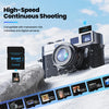 A silver camera is shown with various high-speed memory cards displayed below it on a snowy surface.