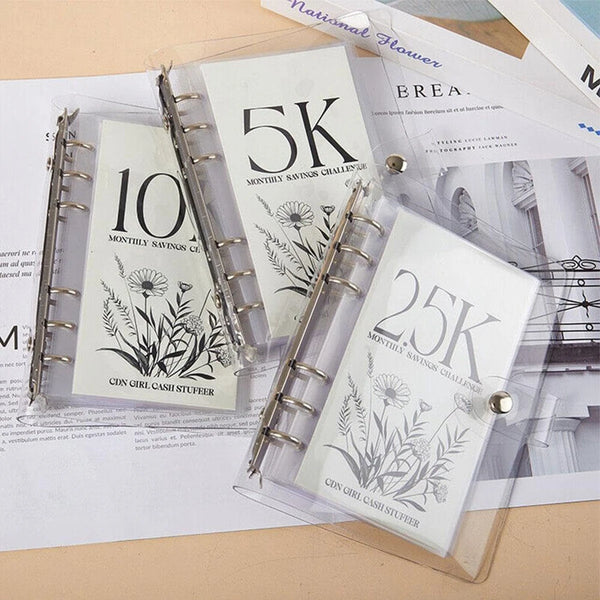 A set of vertical savings challenge money clips showing denominations of 5K, 10K, and 25K