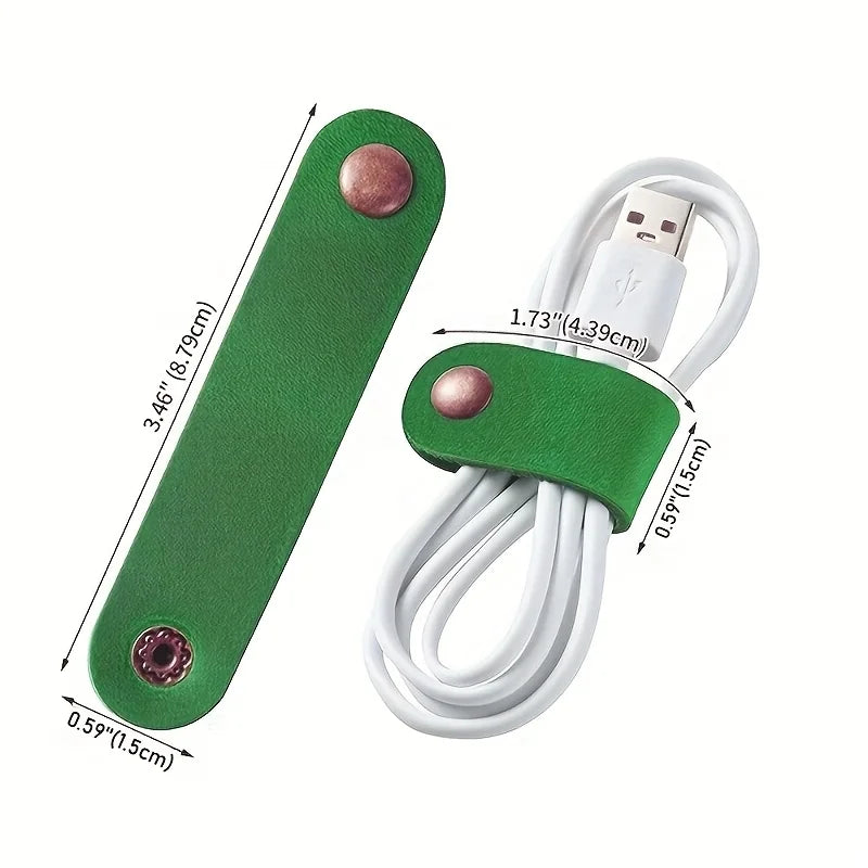 A green faux leather data cable with a connector and earphones is shown next to its coiled white cable.