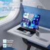 A laptop is shown charging mobile phones and tablets using a multi-port power bank with a flashlight in an airplane cabin set
