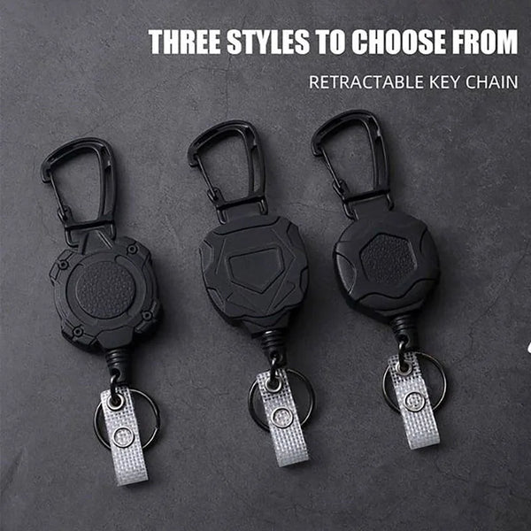 Three styles of black retractable key chains for ID cards and credit cards displayed on a dark surface.