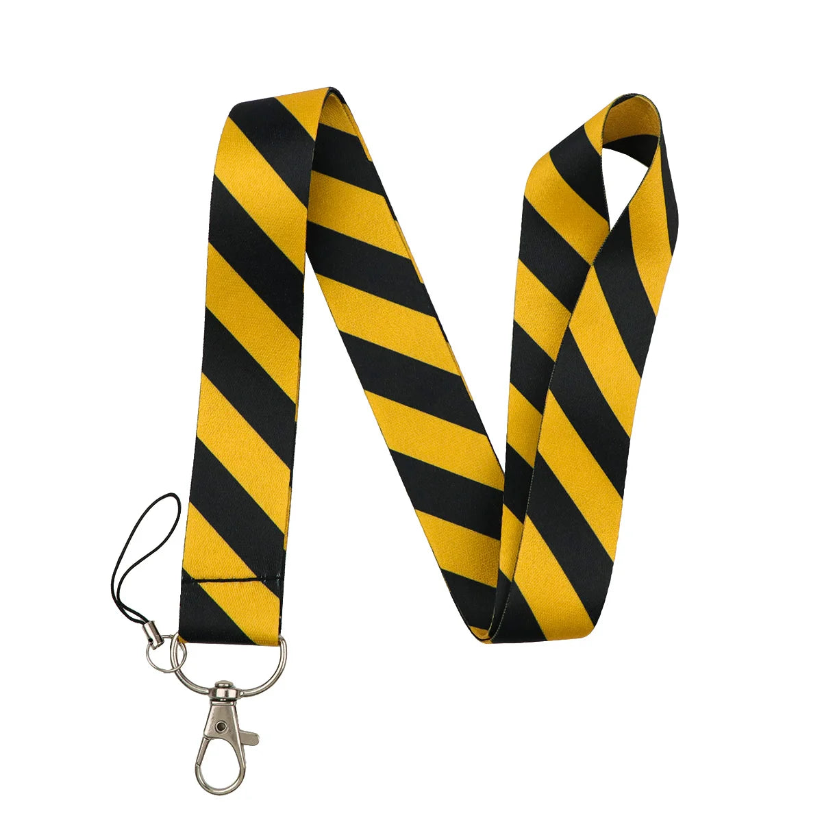 Yellow and black striped vintage cassette tape lanyard with a metal clip.