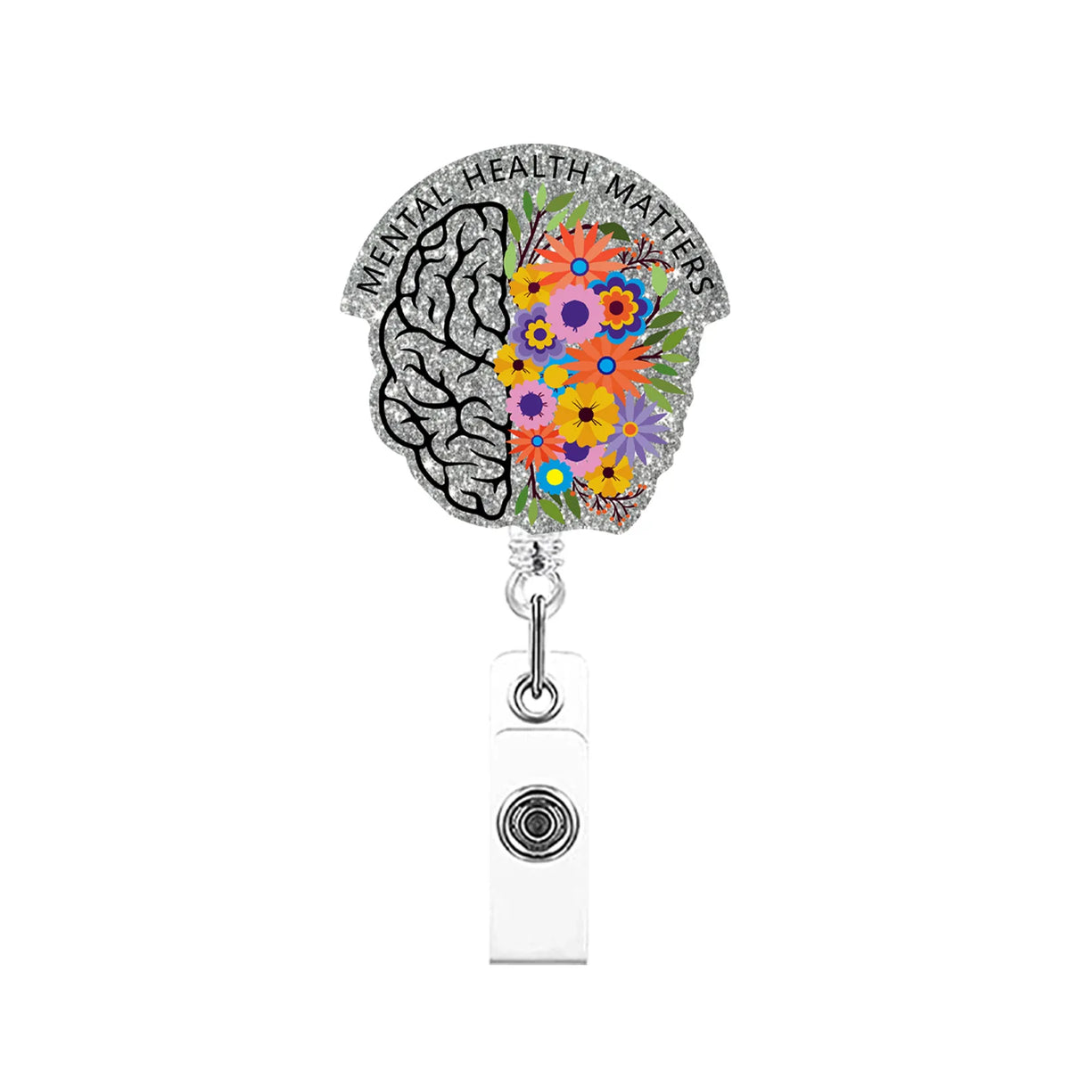A silver badge reel featuring a glitter acrylic design of a brain with flowers and the words Mental Health Matters.