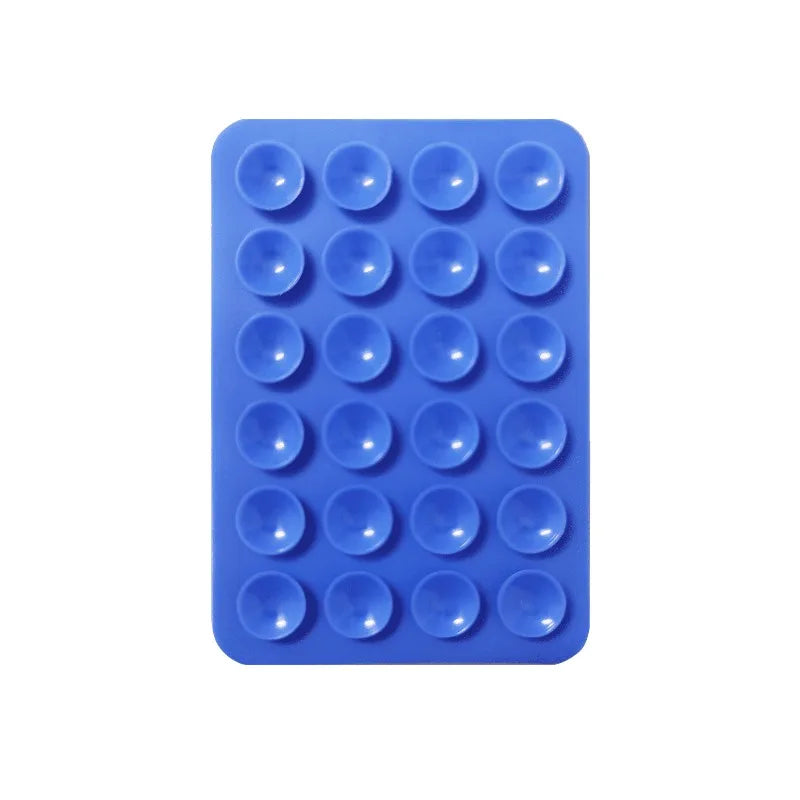 A blue silicone suction cup tray with 24 individual cups for mounting phones and tablets.