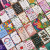 A collection of colorful motivational greeting cards featuring inspirational quotes and floral designs.