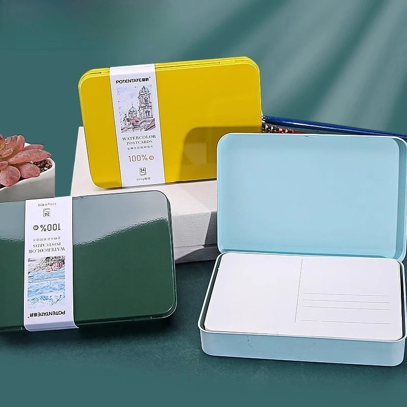 A set of artist grade watercolor paper cards in yellow and light blue packaging.