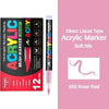 A set of 12 acrylic brush markers in rose red color with soft nibs and a black packaging background.