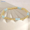 Gold-plated shell pearl beaded bracelet with light blue and gold beads