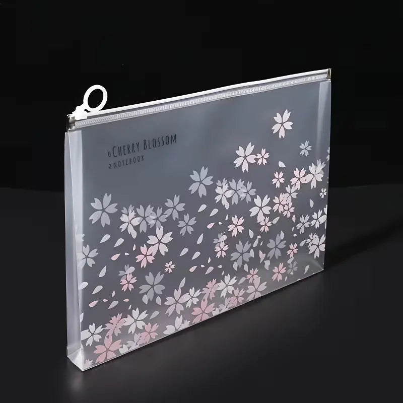 A transparent zipper file bag for an A4 notebook featuring a delicate pink and gray cherry blossom floral pattern.