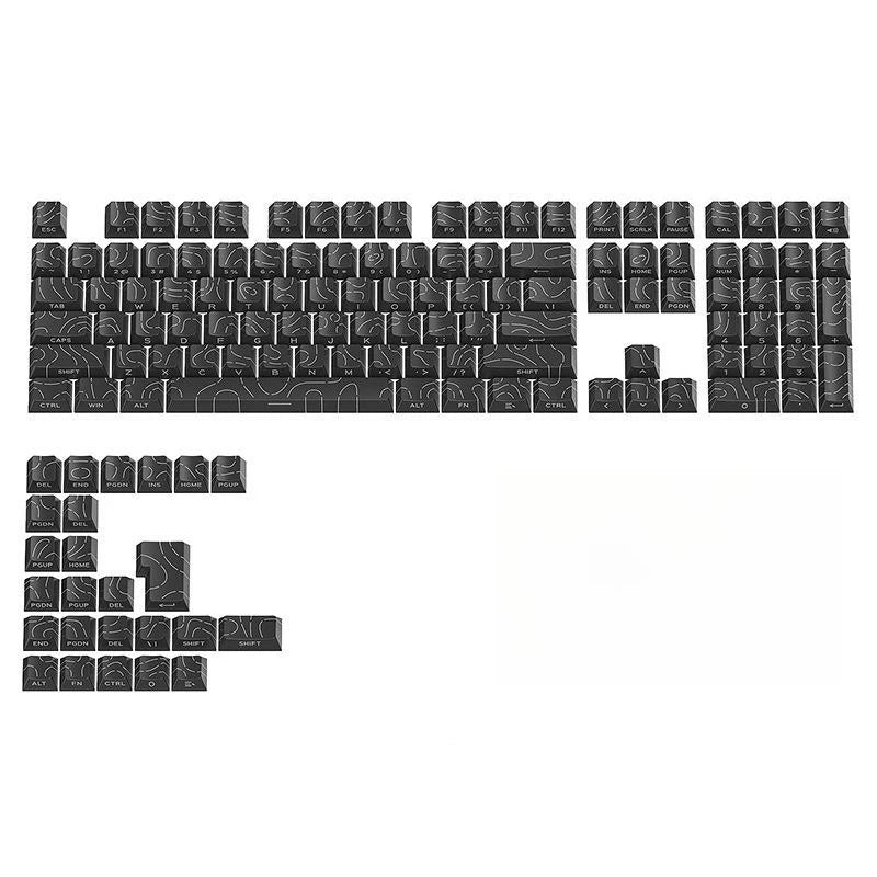 A collection of black mechanical keycaps in a cherry profile for custom keyboards.