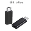 A black USB-C to Micro adapter for charging and data sync.
